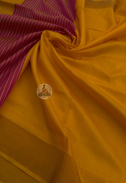 Close-up of handwoven temple motifs on Bishnupur Pure Katan Silk Saree, revealing intricate lotus, conch, and peacock patterns from Bengal's centuries-old Bishnupur weaving tradition