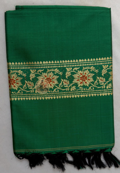 Close-up of terminal panel of Bishnupur Baluchari wearable art stole showing dense mythological narrative detail by Bankura master weavers in silk