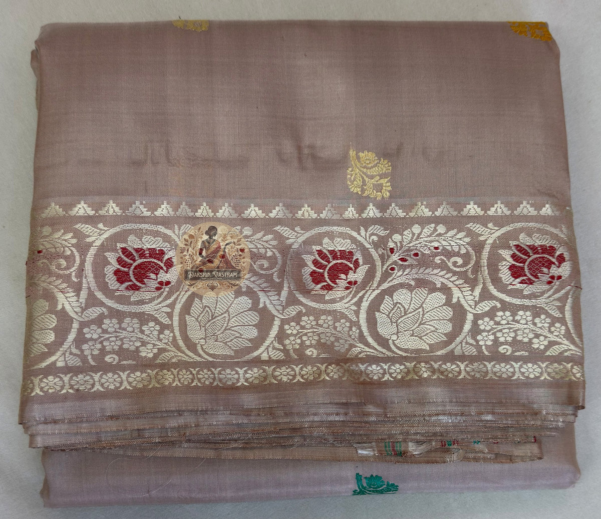 Back drape view of woman in Bishnupur Baluchari Silk saree showing pallu fall and natural lustre of pure Mulberry Silk
