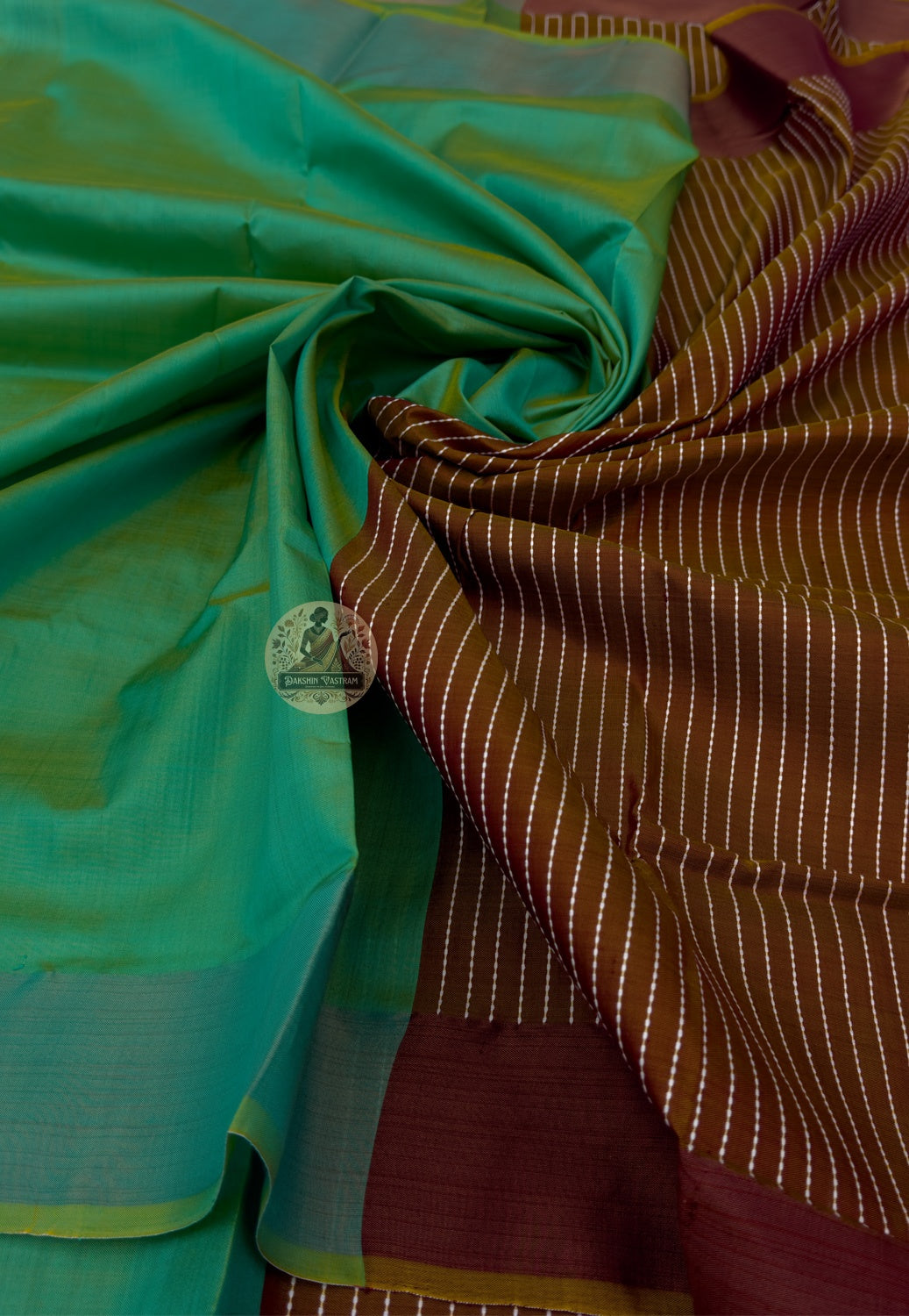 Close-up of handwoven motifs on Bishnupur Pure Katan Silk Saree, revealing intricate temple-inspired and nature-drawn Bengali patterns woven directly into pure Katan silk from Bishnupur, West Bengal