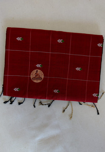 Folded Bishnupuri handwoven pure katan silk saree – showcasing rich silk lustre and woven border, ethically sourced from Bengal artisans by Dakshin Vastram