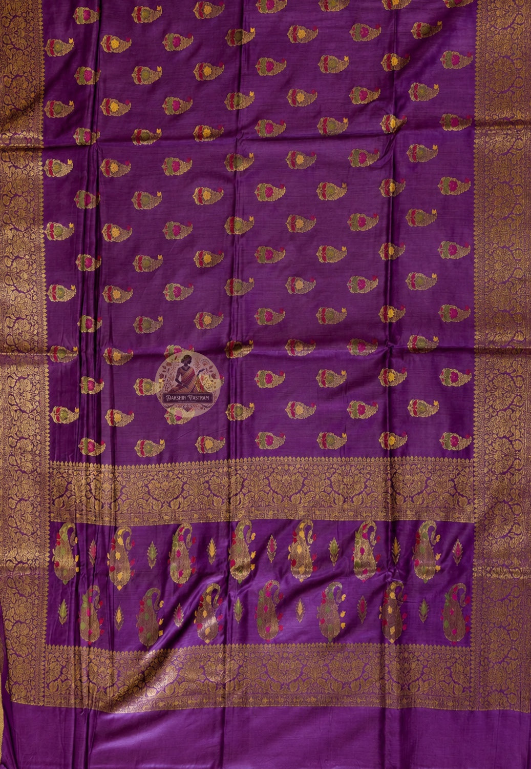 Close-up of pure Muga Tussar silk of Banarasi Saree showing naturally golden wild silk texture, dense handwoven weave and warm luminous sheen