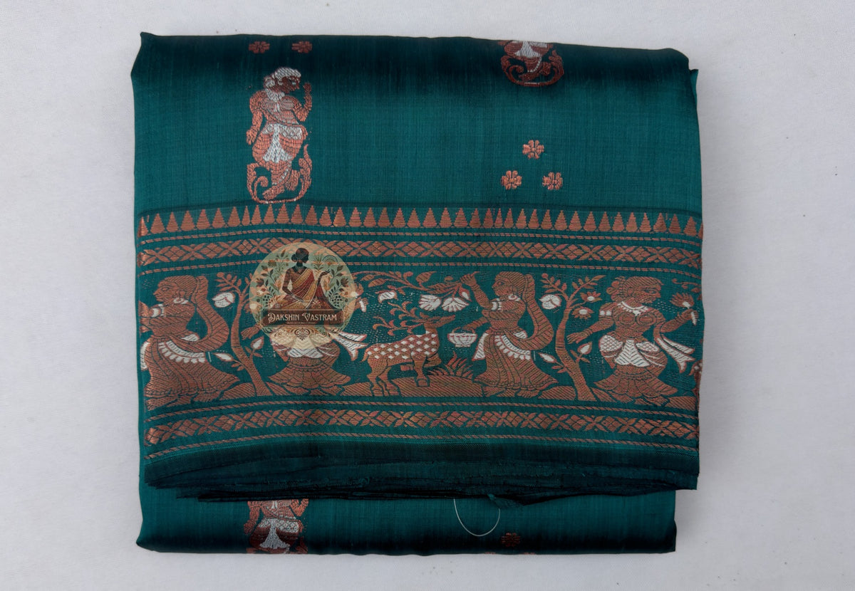 Close-up of bold structured golden zari border on Swarnachari handloom silk saree with fine buti (small woven motif) detailing on silk field