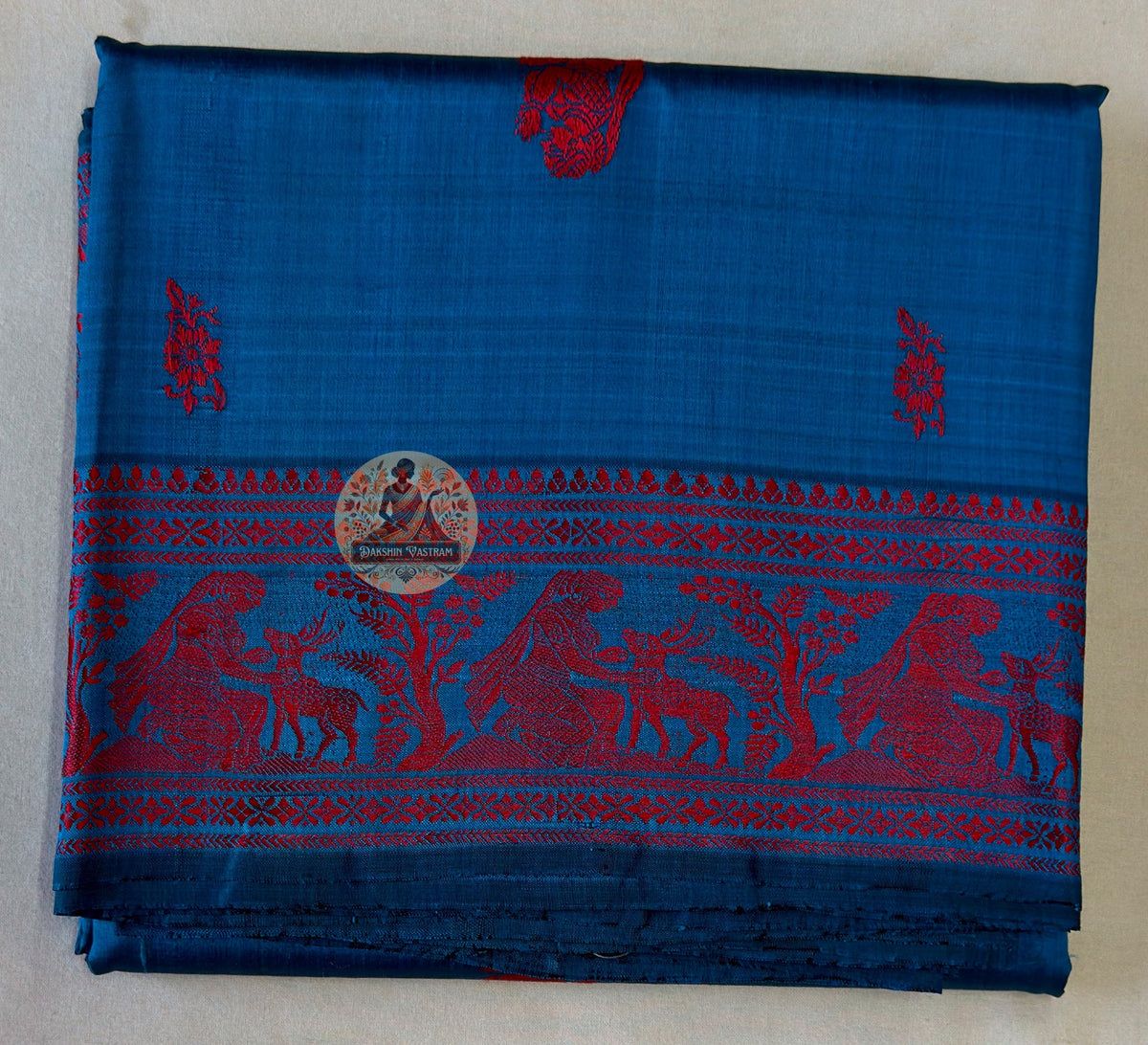 Lustrous Baluchari silk saree in turquoise with figurative weave panels and heritage West Bengal craftsmanship