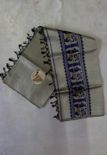 End panel detail of Baluchari pure silk stole – hand-knotted black silk tassels with royal blue woven narrative border, authentic Bishnupur Bengal handloom – Dakshin Vastram