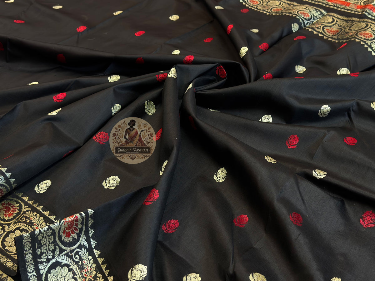 Close-up of pure silk fabric of premium Bishnupur Baluchari Saree showing exceptional natural luminous sheen, fine handwoven texture and soft drape of traditional Bengal silk