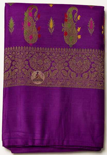 Detailed close-up of Banarasi zari pallu on Muga Tussar Saree with handwoven gold thread butis, paisley motifs and intricate floral jaal border
