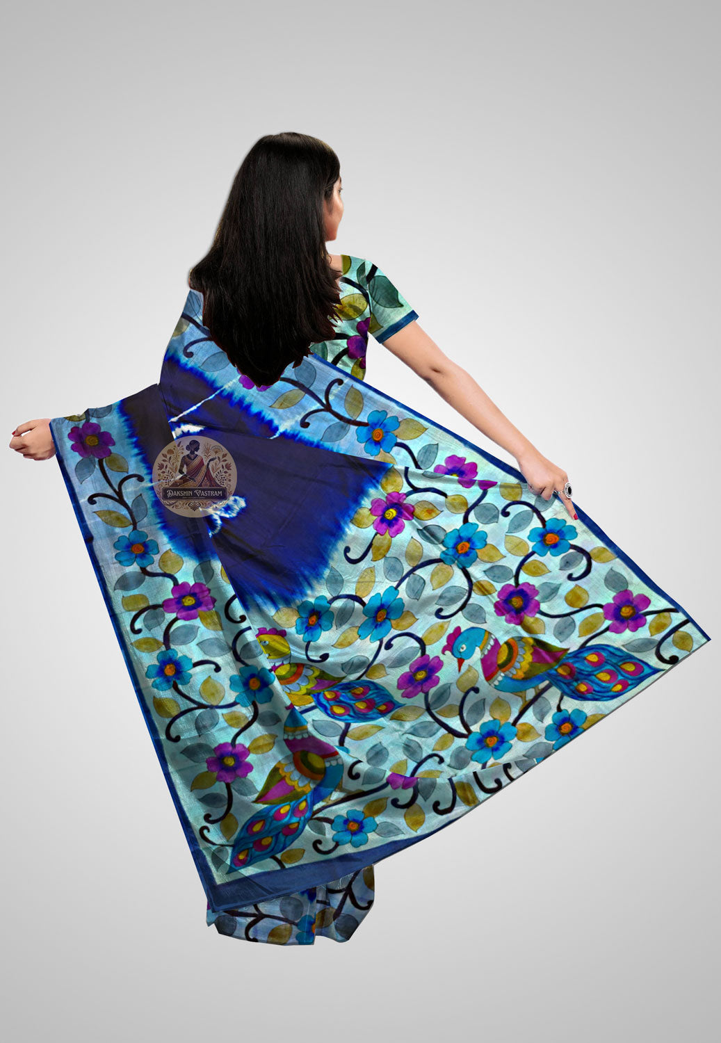 View Pure Silk Saree online – Rear design featuring woven pallu motifs