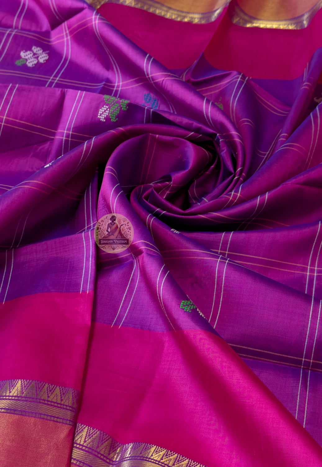 Close-up of Bishnupuri handwoven katan silk weave – dense pure silk threads with natural luminous sheen, traditional Bengal motifs woven directly into the fabric