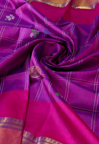 Close-up of Bishnupuri handwoven katan silk weave – dense pure silk threads with natural luminous sheen, traditional Bengal motifs woven directly into the fabric