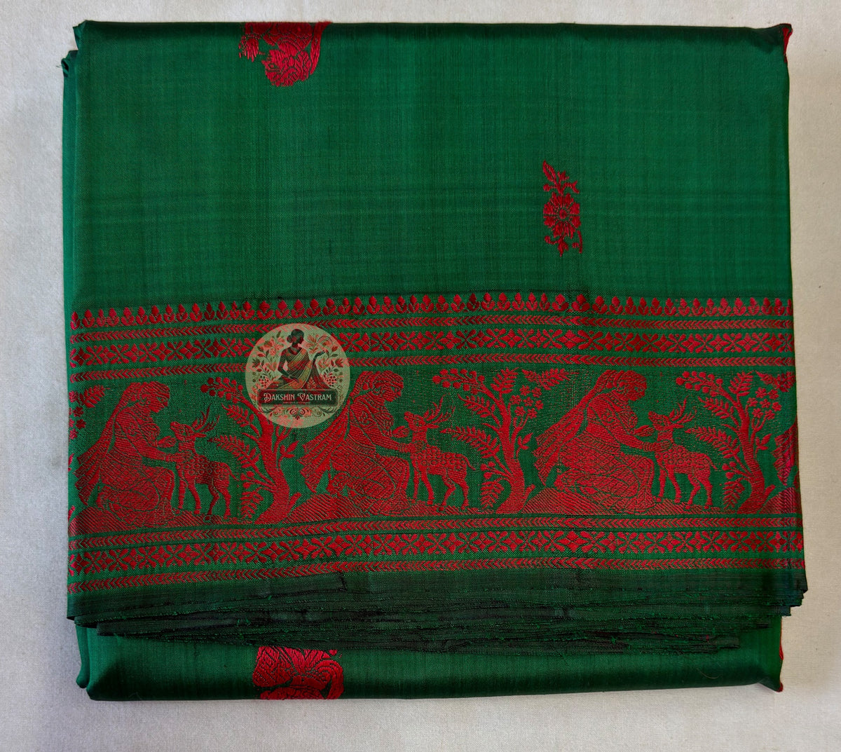 Lustrous Baluchari silk saree in emerald green with narrative weave panels and heritage Bishnupur craft