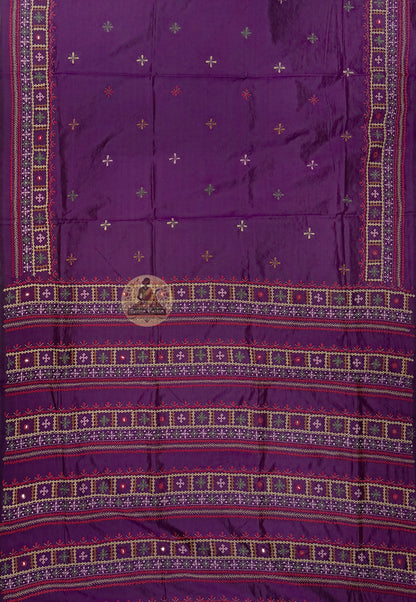 Close-up of hand-worked kantha stitch lotus bloom and peacock in full display on ivory Bishnupur silk saree Bankura West Bengal craft