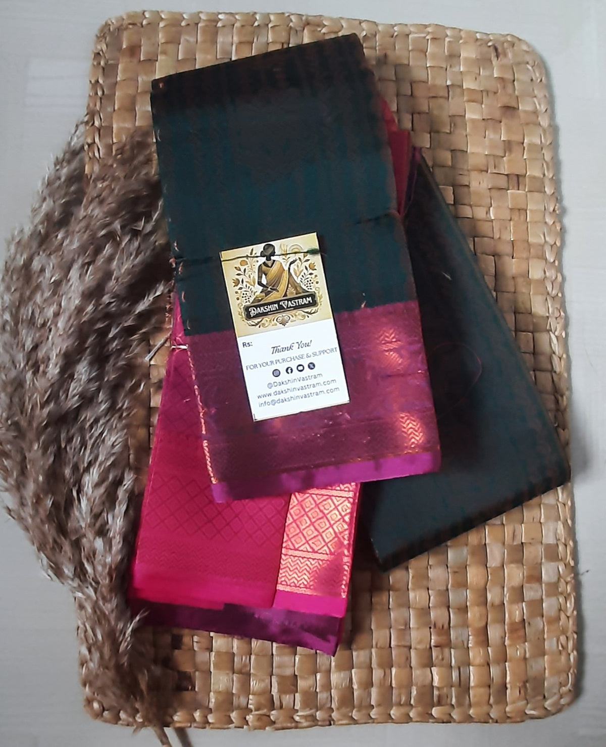 Rear view of Soft Art Silk Saree emphasizing its luxurious drape and sleek finish.