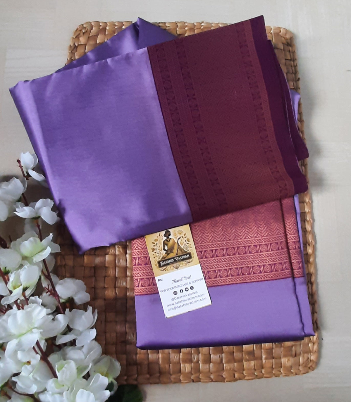 Rear view highlighting the drape and refined texture of the Mow Silk Saree.