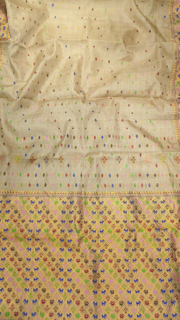 Elegant full drape of gifted Muga Silk Saree in warm honey gold – premium Indian silk for UK delivery